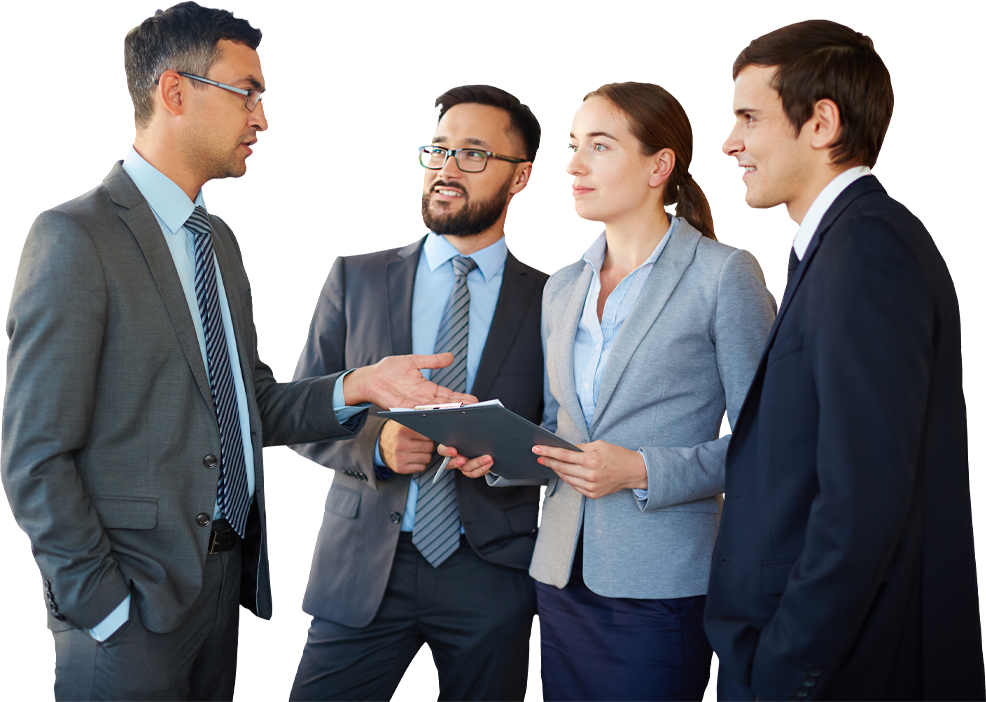 Group of four business professionals engaged in discussion, featuring two men in suits and two women in business attire, holding a clipboard.